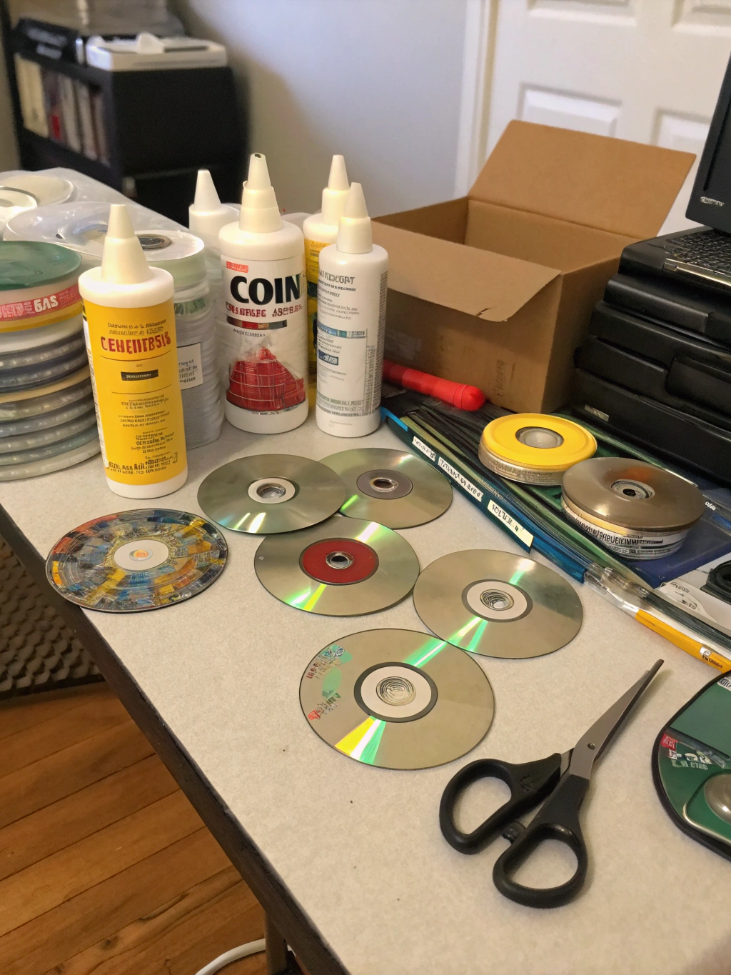 CD Crafts Ideas: 7 Best DIY Projects to Transform Old Discs 2 Essential materials and tools for CD crafts ideas, neatly arranged.