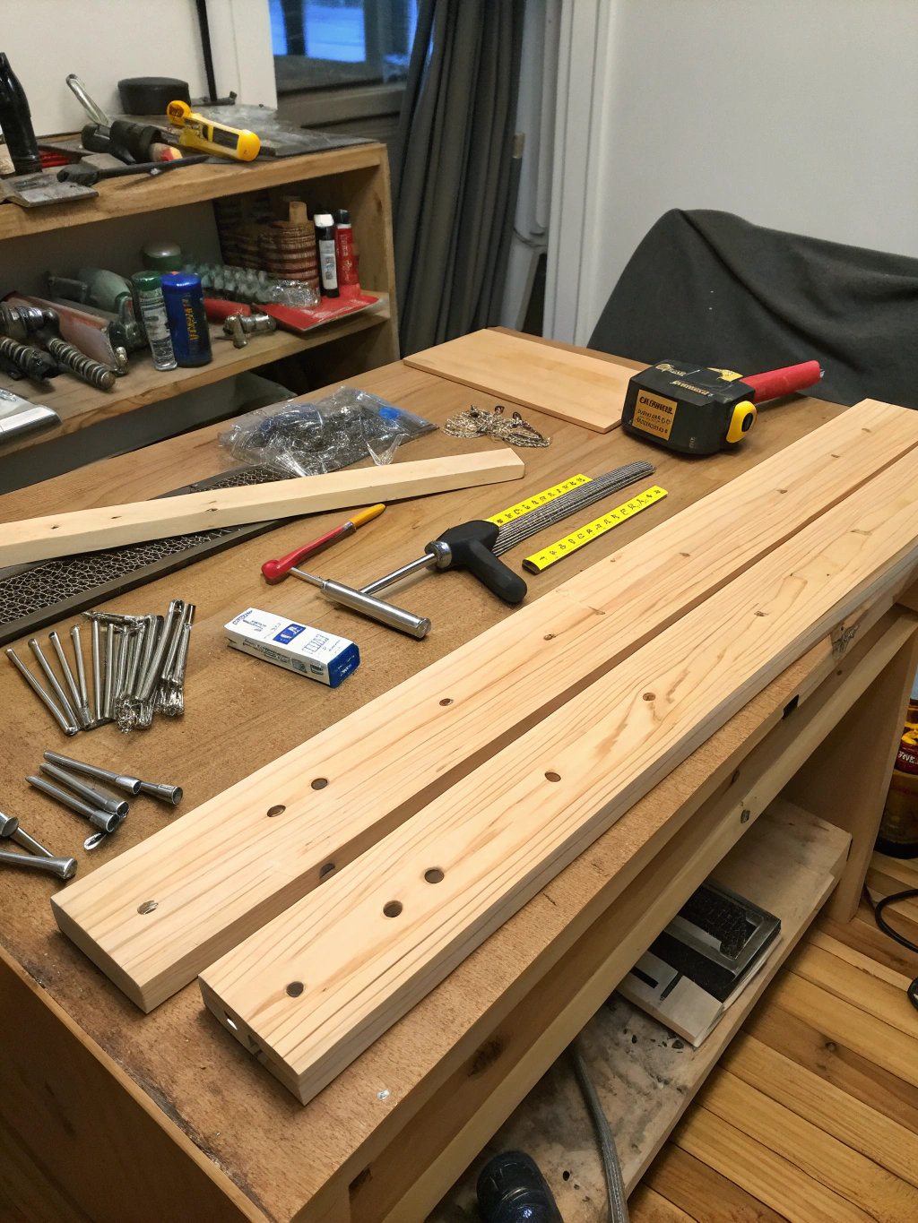 Materials and tools laid out for building a DIY console table.