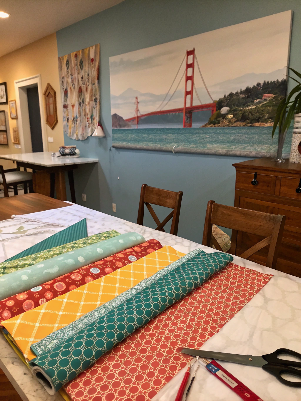 Step 1 of DIY fabric wall art: Fabric laid out with a wooden frame on top, ready for measuring and cutting.