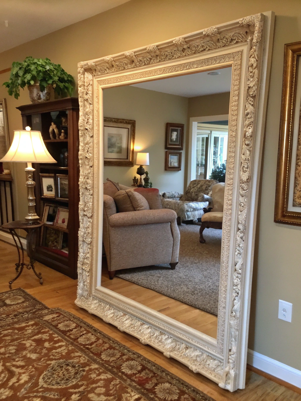 A wide shot of the finished DIY picture frame molding hanging proudly on a wall, perfectly displaying a piece of art or a photo. The frame looks professional and complements the room's decor.