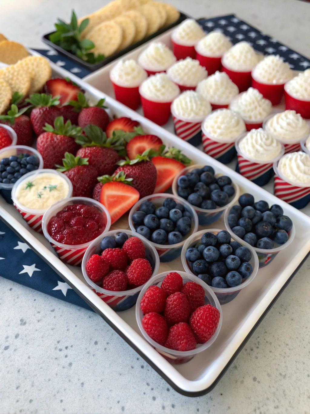 A vibrant spread of no-bake red, white, and blue desserts, perfect for a patriotic celebration.